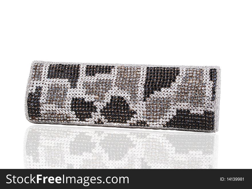 This is a beautiful ladies fancy clutch purse isolated on a white background.