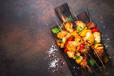 Chicken Kebab With Vegetables On Skewers Top View. Royalty Free Stock Images