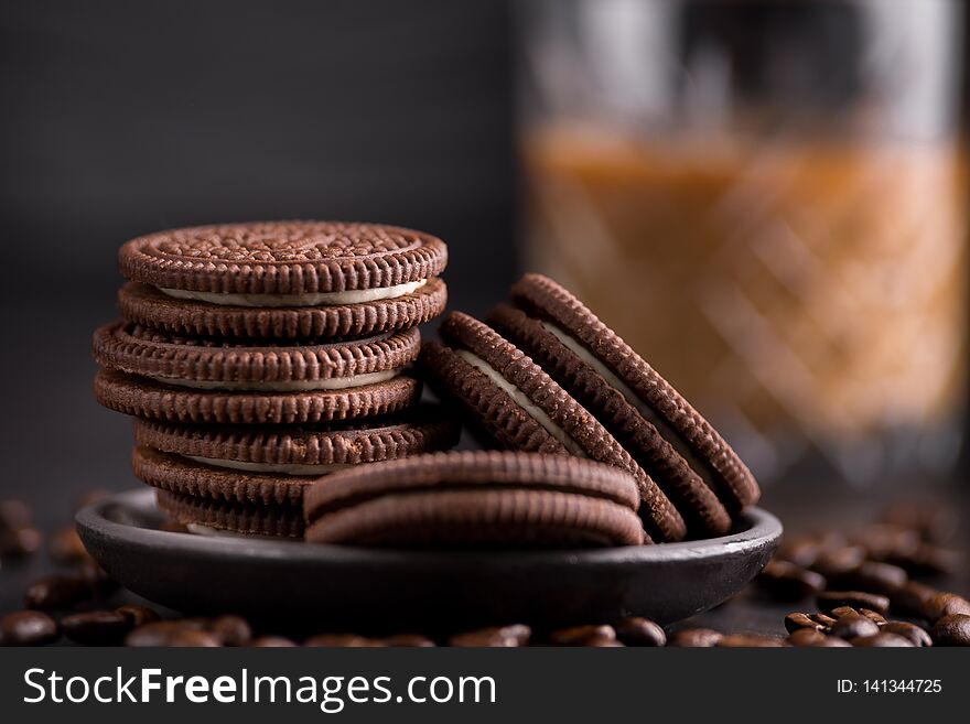 Chocolate Chips Cookies On Black Background. Latte Coffee On Background.