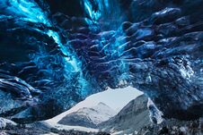 Amazing Ice Cave. Blue Crystal Ice Cave And An Underground River Beneath The Glacier. Amazing Nature Of Skaftafell. Stock Images