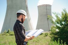 Engineering Work At The Power Plant, Check The Information On Paper. Royalty Free Stock Image