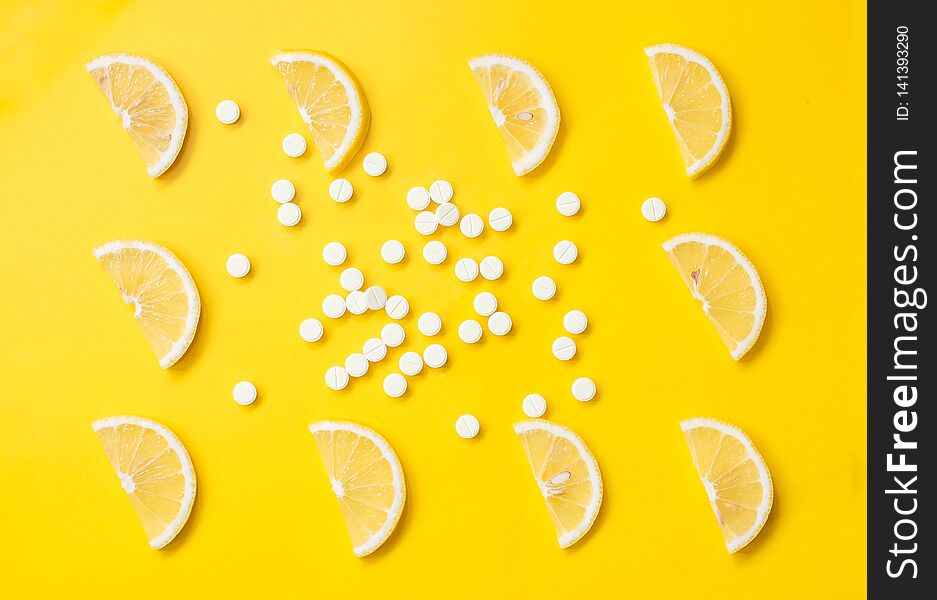 Vitamin C. Slices Of Lemon On A Bright Background And Vitamin C Pills. Beauty Product Branding Mock-up. Top View.