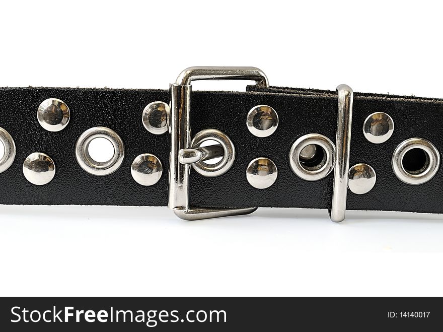 Fragment of a black belt and buckle, isolated on a white background