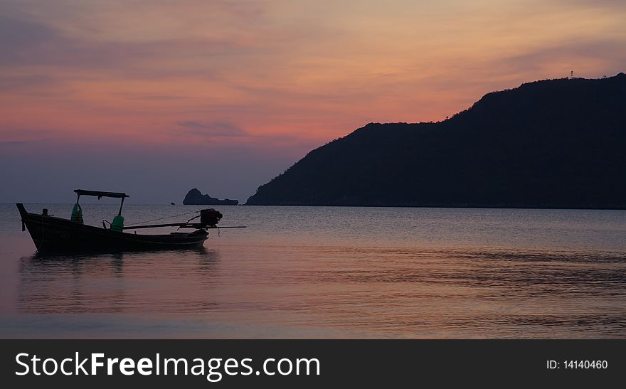 An empty boat is waiting to be occupied by the fisherman in the very morning, Thailand. An empty boat is waiting to be occupied by the fisherman in the very morning, Thailand.