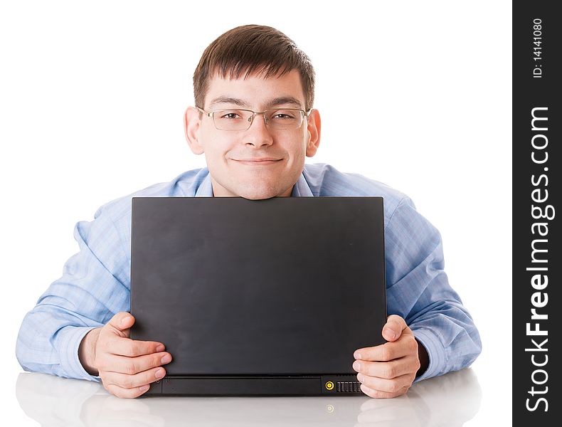 Young smiling man with laptop on white background
