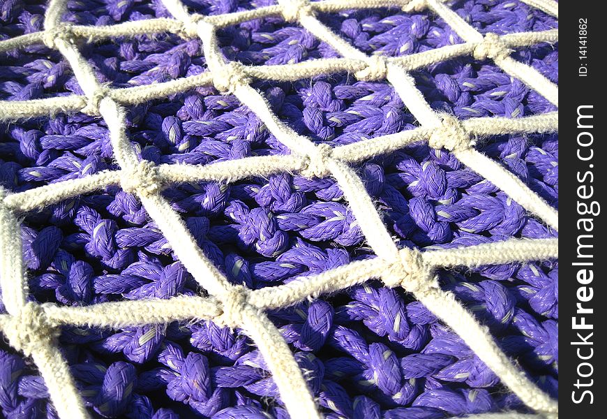 Blue Fishing net on a harbpur in Spain