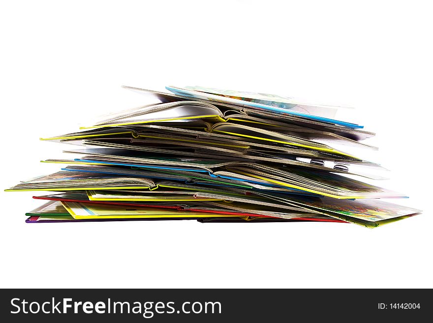 Pile of open bright thin books isolated on white background. Pile of open bright thin books isolated on white background