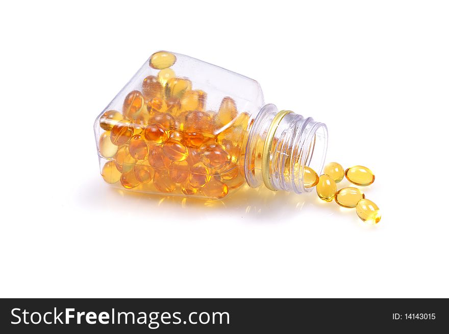 Fish oil capsules with bottle isolated on white background. Fish oil capsules with bottle isolated on white background.
