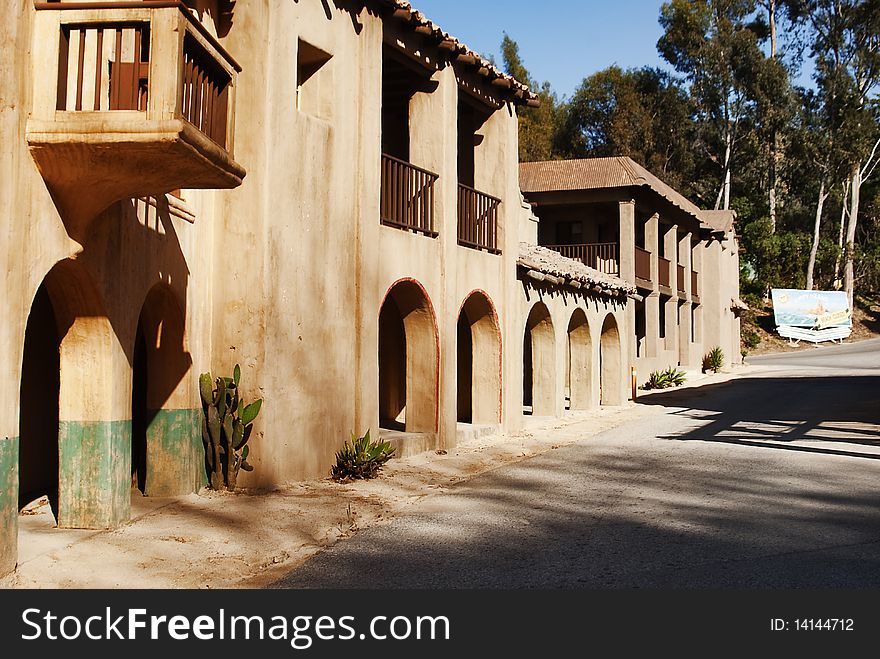 An old mexican villa mlooking street. An old mexican villa mlooking street