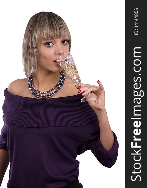 Woman drinking white wine. Portrait of beautiful girl with glass white wine. Young attractive female is holding a glass of champagne