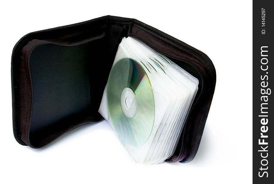 Black CD valet opened with several discs inserted