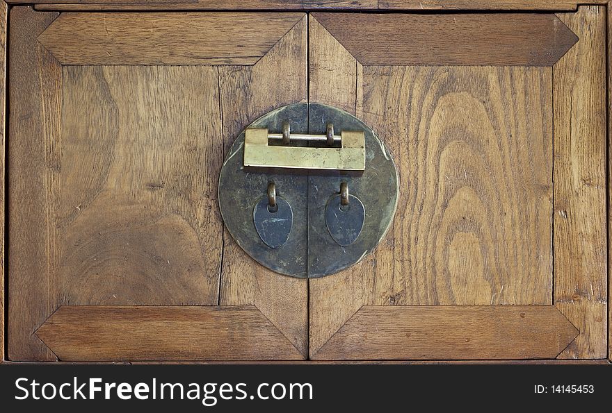 The doors and lock to a fifteenth century Chinese walnut chest. The doors and lock to a fifteenth century Chinese walnut chest