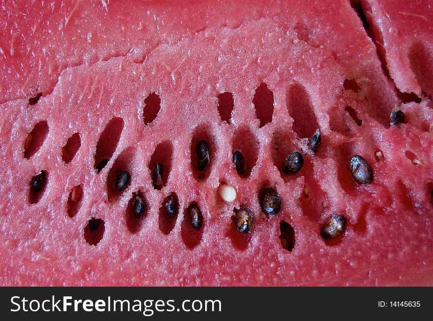 Closeup watermelon cut texture with pulp and seeds