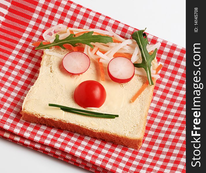 Slice of white bread and fresh vegetables. Slice of white bread and fresh vegetables