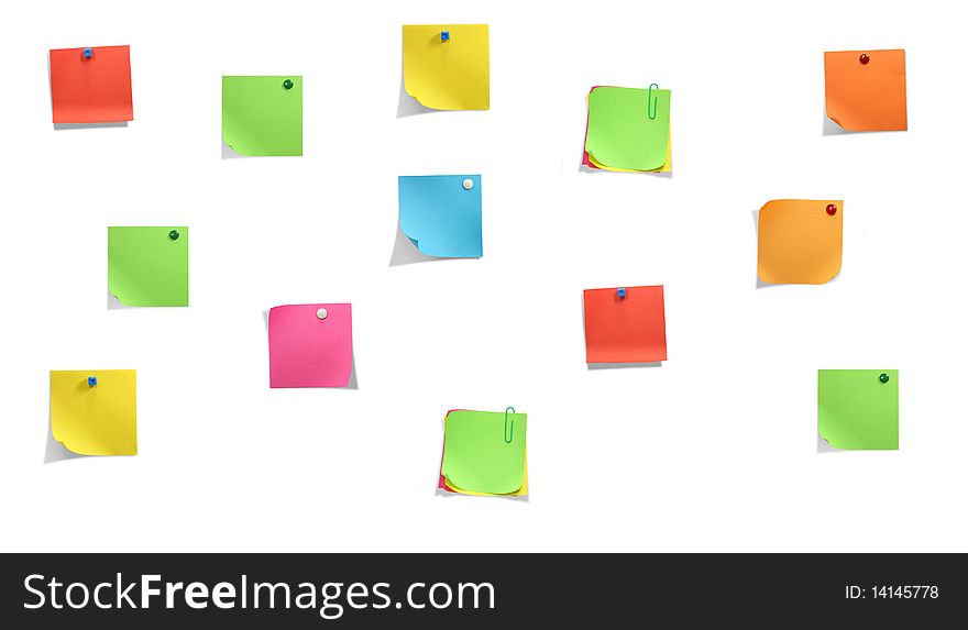 Brightly colored stickers on the white wall