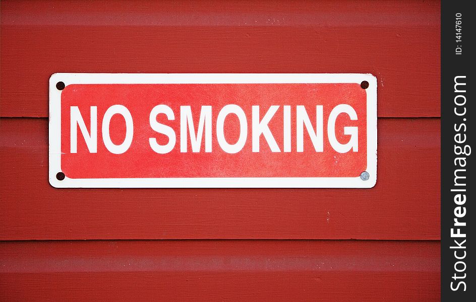 No smoking sign mounted on wall