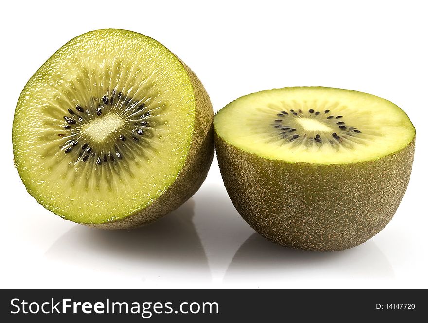 Golden Kiwi fruit halved isolated on white