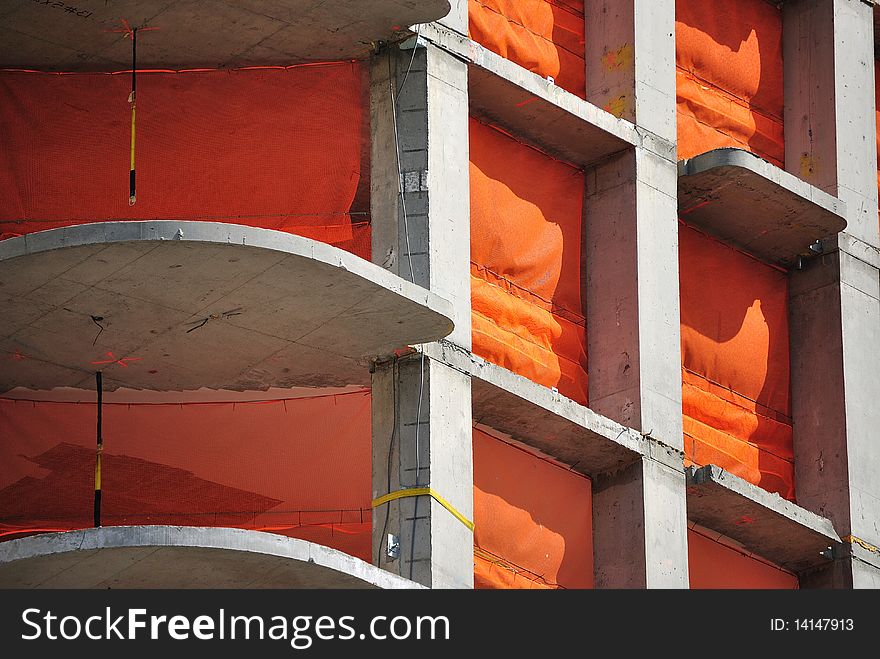 Orange tarp covers the open floors of a newly built building on the Upper West Side of Manhattan. Orange tarp covers the open floors of a newly built building on the Upper West Side of Manhattan.