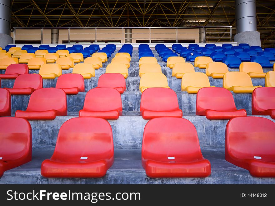 Stadium seats in row with colorful