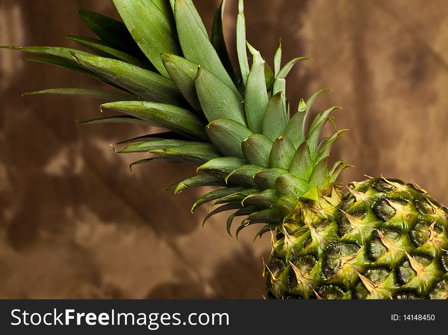 Photo of pineapple on wood table