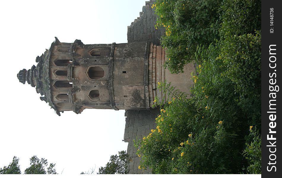 Historical, artistically designed watch tower in the corner of compound of Lotus Mahal at Hampi, Karnataka, India, Asia. Historical, artistically designed watch tower in the corner of compound of Lotus Mahal at Hampi, Karnataka, India, Asia