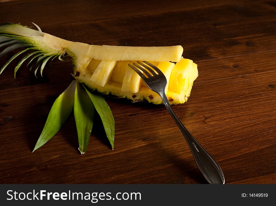 Pineapple On Wood Table