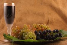 Glass Of Wine, Grapes On A Plate Stock Photo Glass Of Wine, Grapes On A Plate Stock Photo