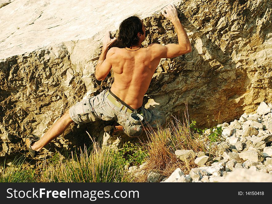 Climber in a boulder problem. Climber in a boulder problem