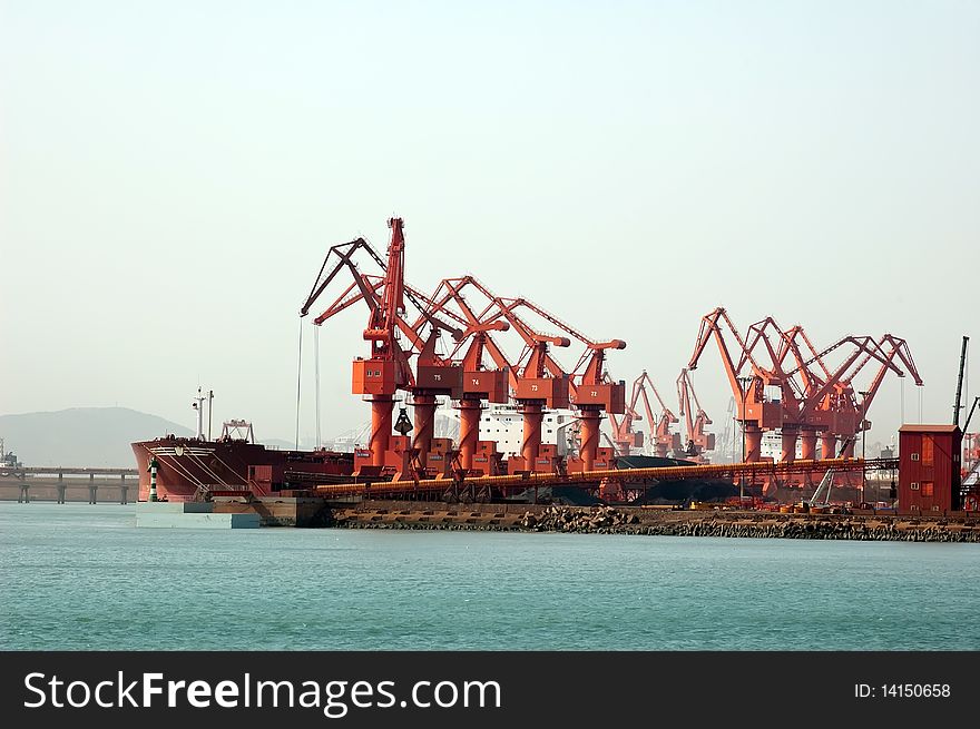 Large Bulk carrier in a dock at Qingdao China. Large Bulk carrier in a dock at Qingdao China