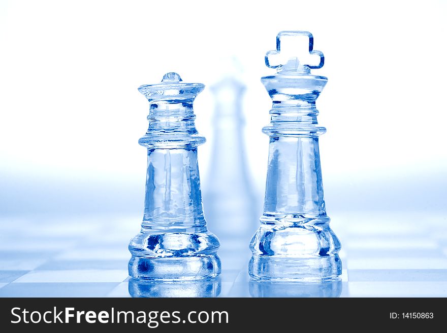 Glass Chess Pieces With Blue Light