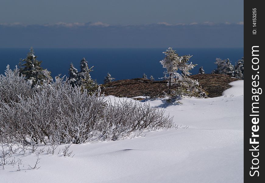 Snow and Ice covered summit of a coastal mountain. Snow and Ice covered summit of a coastal mountain