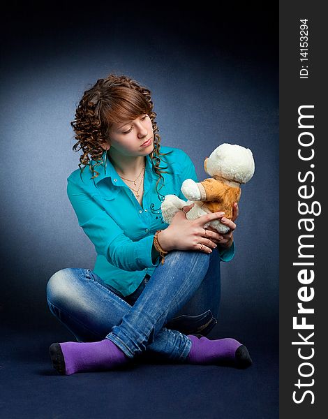 Young teen with teddy