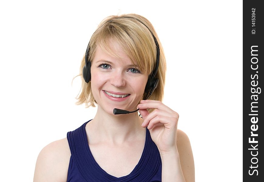 Young woman smiling talking with headset isolated on white. Young woman smiling talking with headset isolated on white