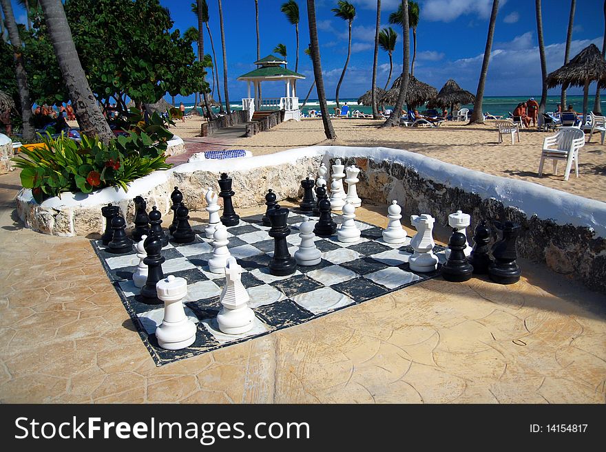 Live size chess on beach in tropical resort, Dominican Republic