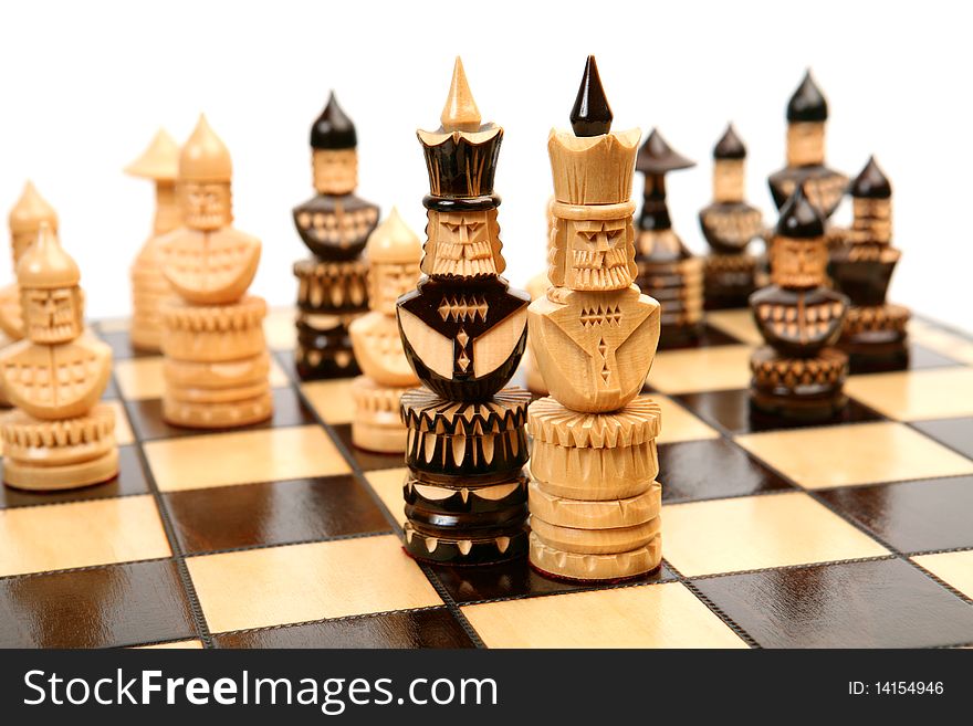 Wooden chess on a white background