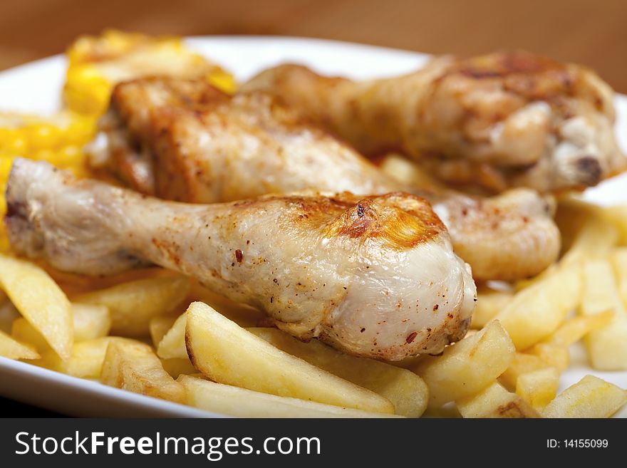 Grilled chicken leg and chips