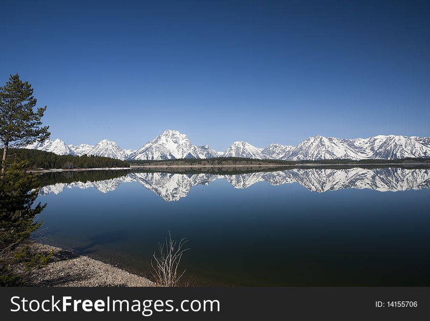 Reflection in the lac of the Grand Tetons in Wyoming