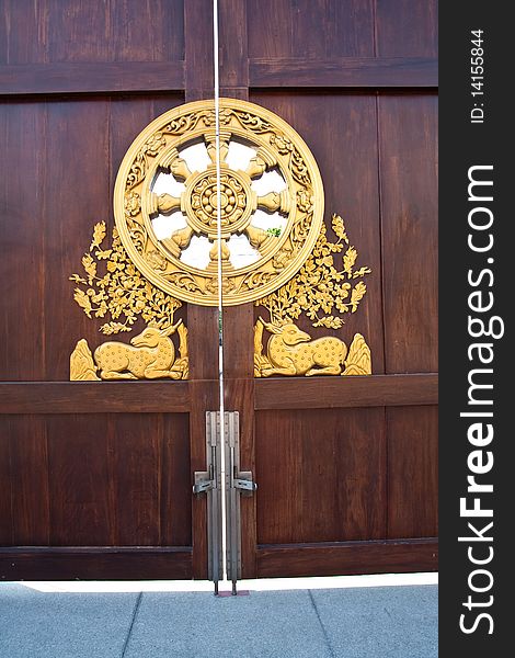 The locked symbol door in baromraja temple thailand