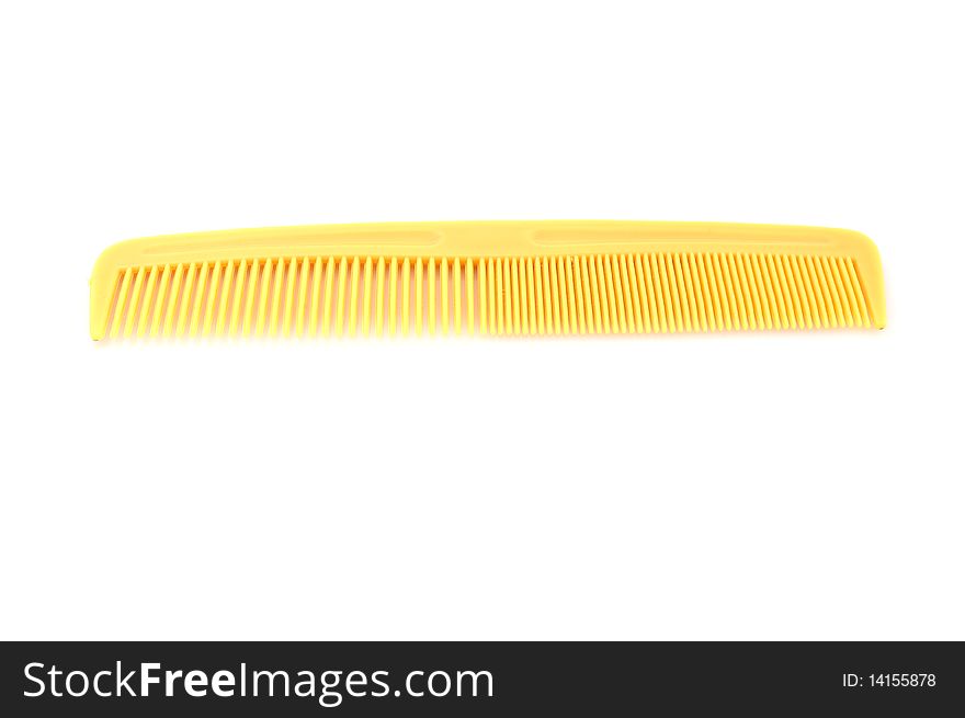 Single  comb at the white background