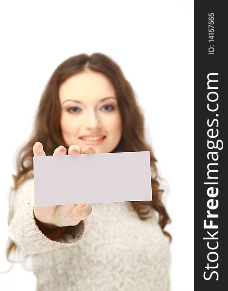 Young woman holding an empty billboard over white background