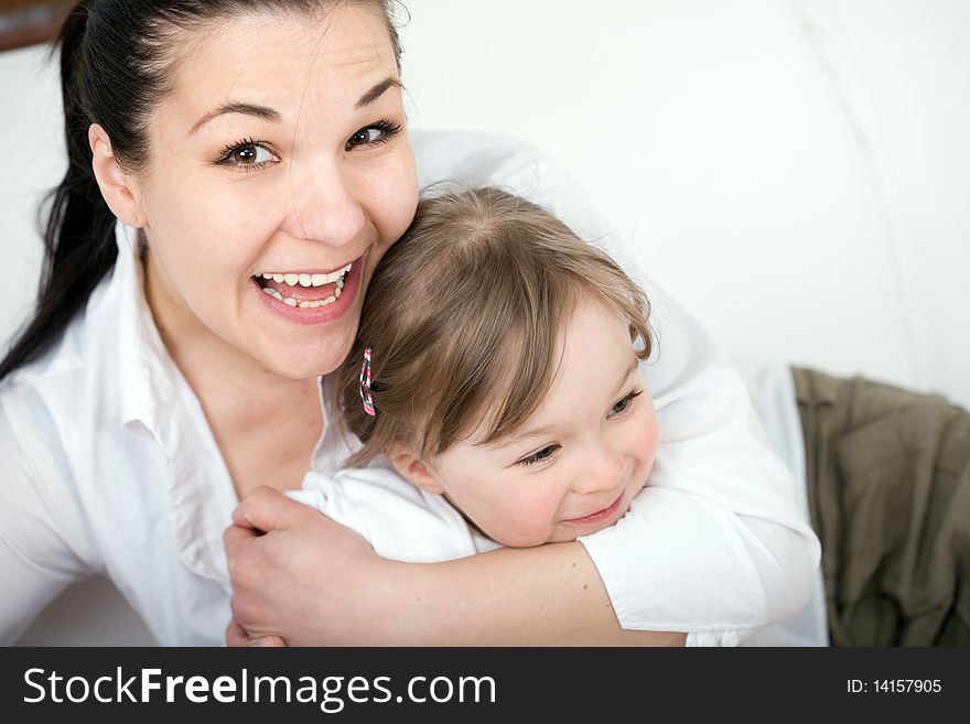 Mother and daughter having fun at home. Mother and daughter having fun at home