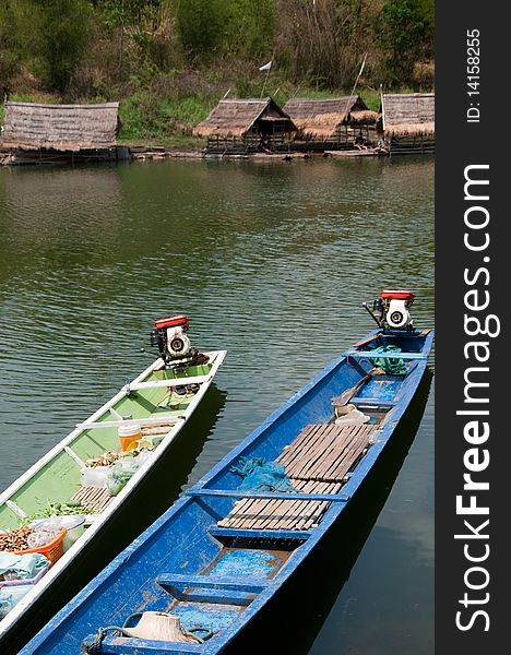 Row boats for bring a traveling raft into the lake, Loei Province, Thailand. Row boats for bring a traveling raft into the lake, Loei Province, Thailand.