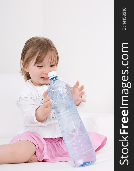 Happy little girl with water. Happy little girl with water