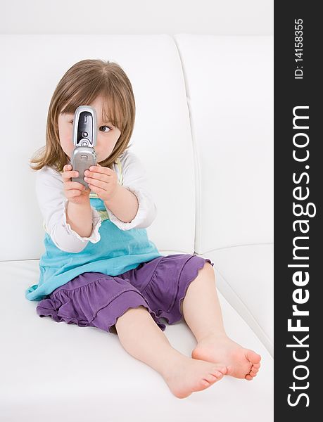 Little girl with mobile phone