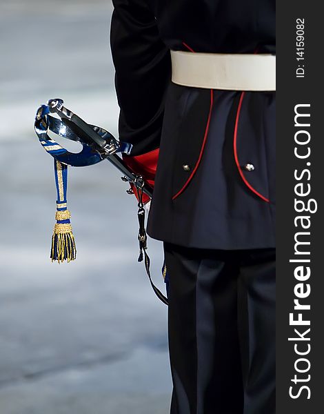Sword in hand of military musician of Italy