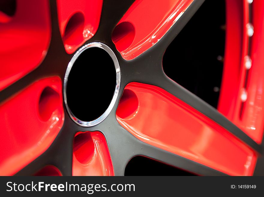 Red Metallic tyre disc of a sport car