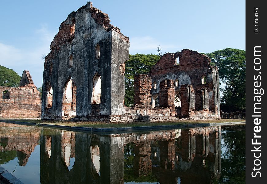 Lopburi historic buildings on clear sky reflected water. Lopburi historic buildings on clear sky reflected water.