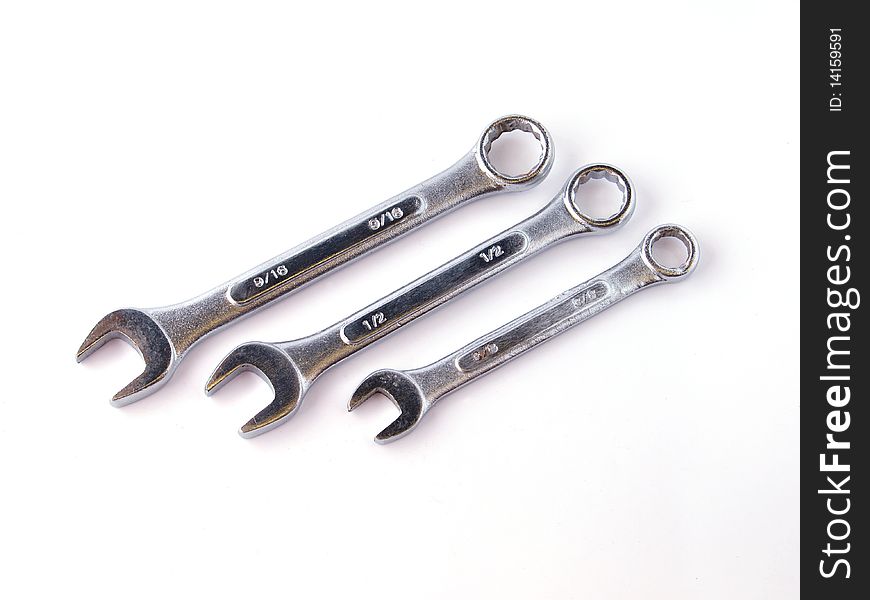 Chrome spanners on a white background.