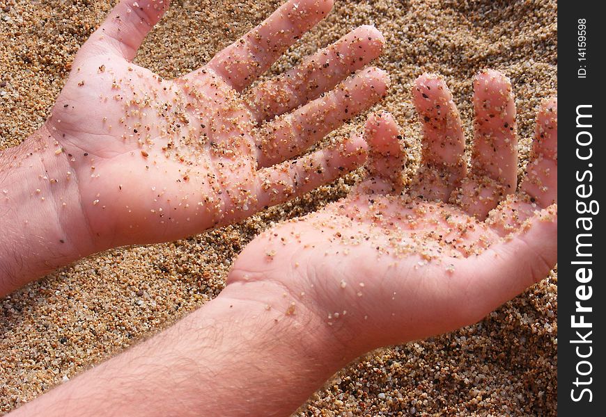 Caucasus man, sandy gritty hand