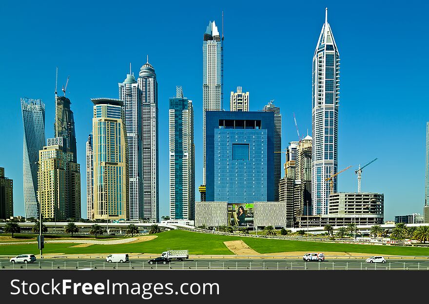 DUBAI, UAE - January 24, 2016: Modern buildings Business Skyscrapers Skyline view of Sheikh Zayed Road, Dubai, UAE. DUBAI, UAE - January 24, 2016: Modern buildings Business Skyscrapers Skyline view of Sheikh Zayed Road, Dubai, UAE